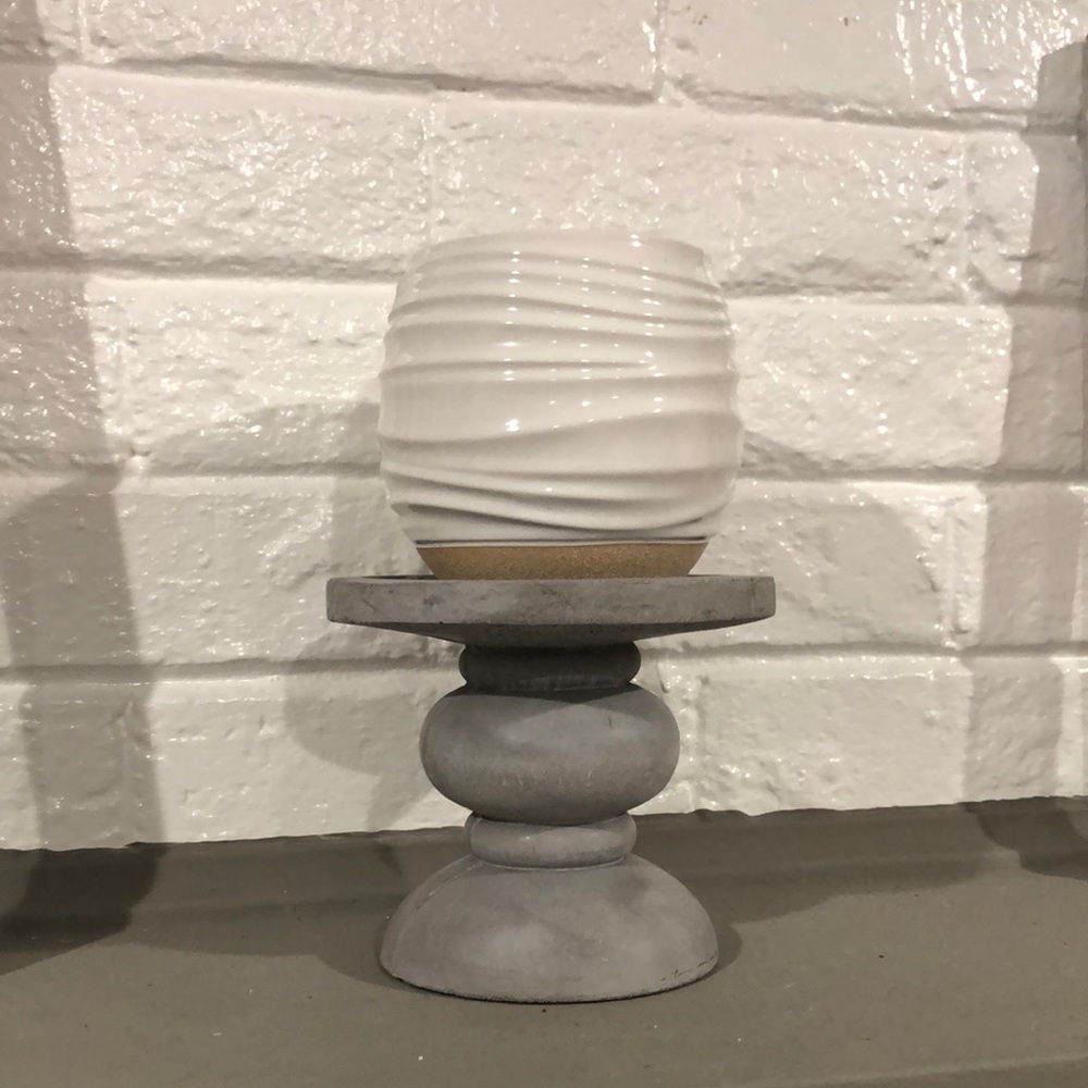 Gray candle stand